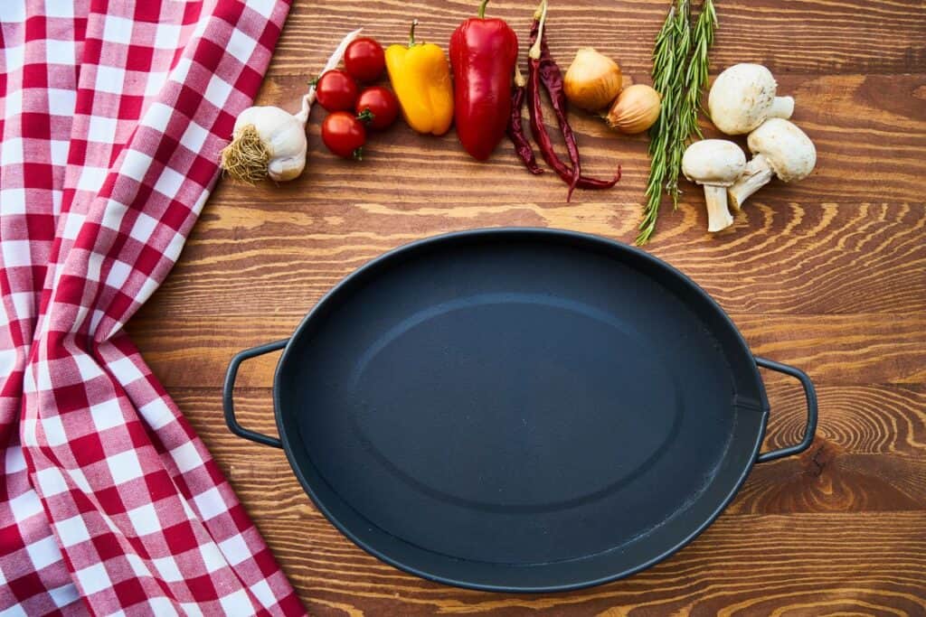 cast iron vs carbon steel cookware